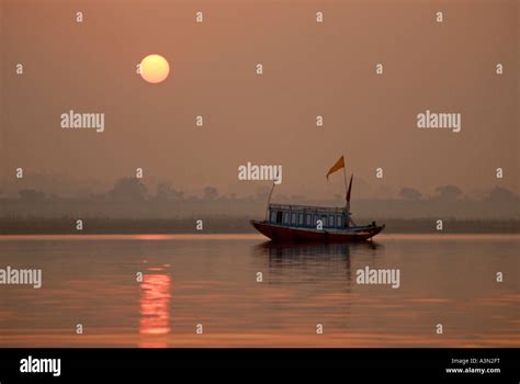 Sunrise over the Ganges River, Varanasi, India Stock Photo - Alamy