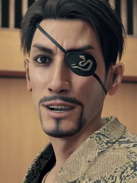 a close up of a person with an eye patch on their face and snake skin around his eyes