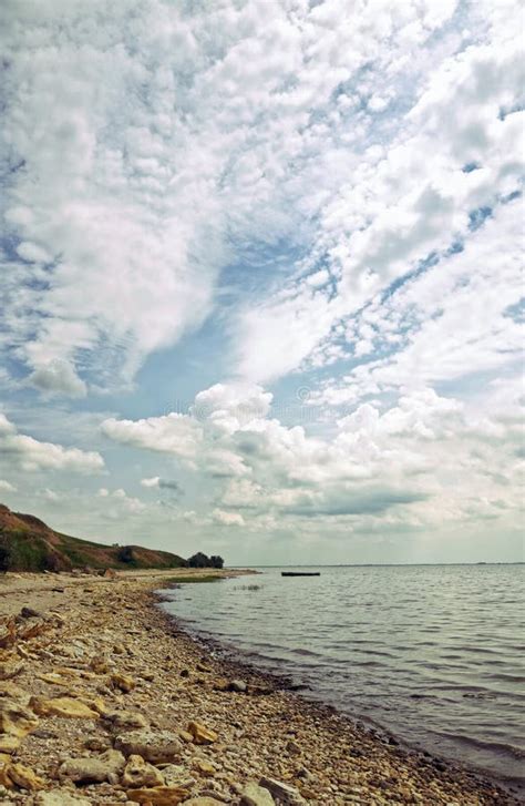 Stony Sea Beach. Coast of the Azov Sea Stock Image - Image of cloudy, landscape: 86368113