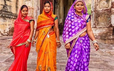 Senior Indian Woman Dressed In Traditional Attire Cleaning Stock Photo ...