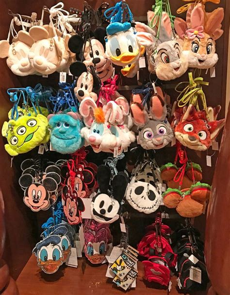 many disney mouse key chains are on display