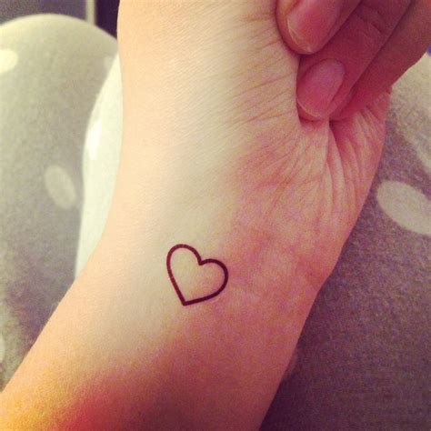 Amazing Tiny Heart Tattoo On Wrist
