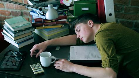 Tired Student Sleeping On Desk Notes At Home Stock Footage SBV ...