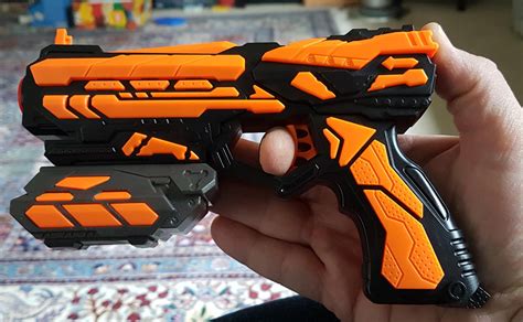 New knockoff Nerf? Found this foam dart shooter at a discount shop here ...