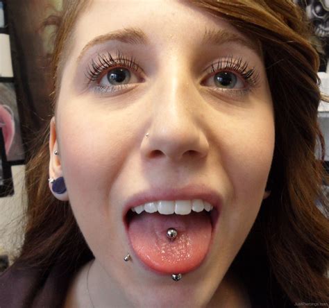 Labret And Vertical Tongue Piercing