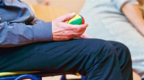 Person Holding Multicolored Ball · Free Stock Photo