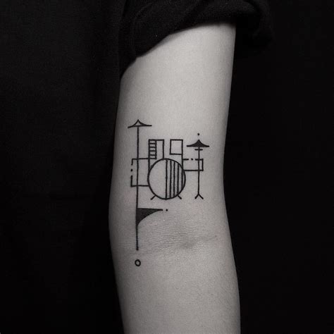 Drum kit tattoo by tattooist Hen - Tattoogrid.net