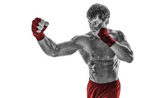 Portrait of Boxer Who Practicing Right Hook on White Background. Black and White. Red Sportswear ...