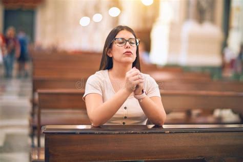 Young Beautiful Woman Praying on Her Knees in a Bench at Church Stock Image - Image of female ...