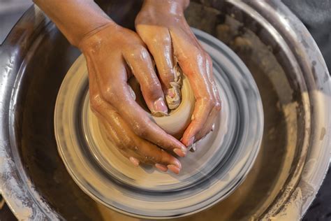 Hands shaping pottery 2378310 Stock Photo at Vecteezy