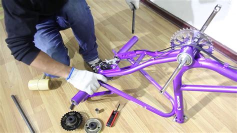 MoonCool FoldableTricycle SevenSpeed Assembly - Replacing Rear Axle Pole - YouTube