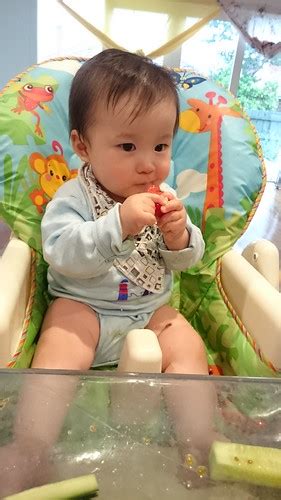 Liam eating cherry tomatoes at the dinner table | He wanted … | Flickr