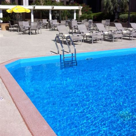 Love the newly remodeled swimming pool at the Hilton Savannah DeSoto | Swimming pools, Savannah ...