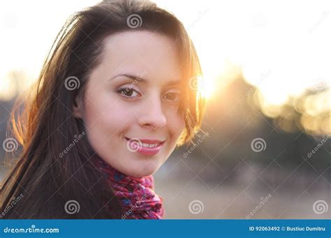 Image of a Face Beautiful Female Model in a Colorful Cotton Scarf Closeup on Sunset Background ...