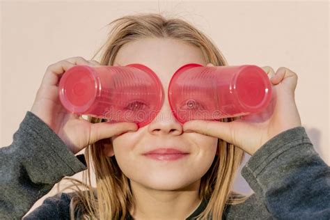 Young Girl Playing with Plastic Cups Stock Image - Image of cheerful, fresh: 165684475