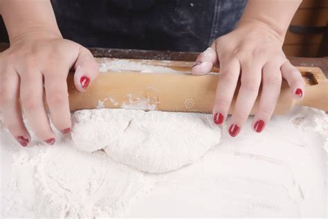 Woman Rolling Dough with Rolling Pin. Stock Photo - Image of culinary, baking: 88010926