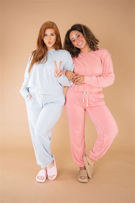 two women wearing cute matching sweatsuits