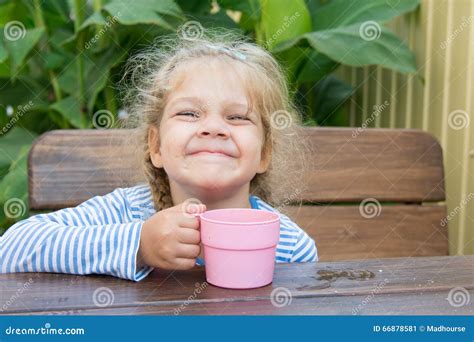 Four-year Girl Hamming Sitting at a Table with a Glass of Juice Stock Image - Image of four ...