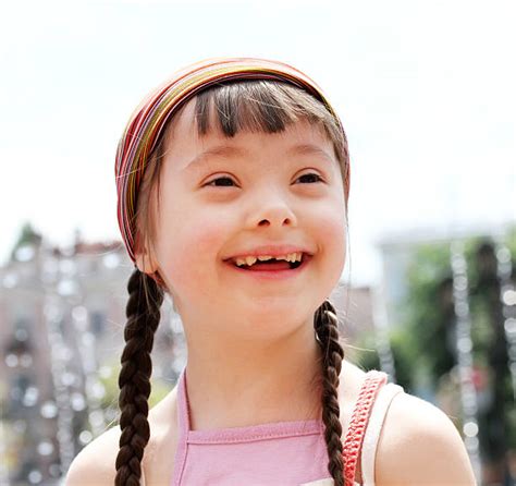 Girl With Down Syndrome Pictures, Images and Stock Photos - iStock