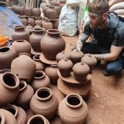 Mumbai Dharavi: Private Slum Tour with Lunch & Pottery class | GetYourGuide