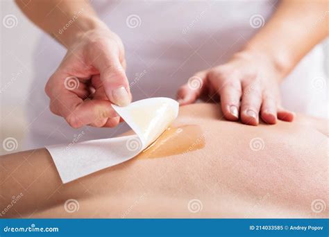 Woman Waxing Man`s Chest with Wax Strip Stock Image - Image of ...