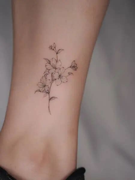 Details more than 78 fine line cherry blossom tattoo best - in.cdgdbentre