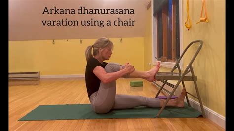 Akarna dhanurasana variation using a chair - YouTube