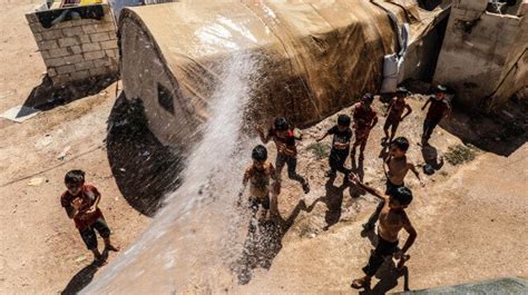 Syrians in Idlib refugee camp struggle to survive in tents as mercury ...