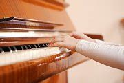 Girl playing piano. Close up on | Stock Photos ~ Creative Market