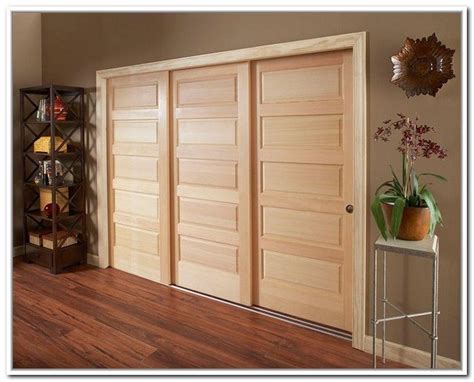 three sliding doors for closet | Stunning Triple Bypass Sliding Closet ...