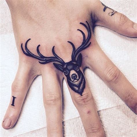 #stag #antlers #hand #tattoo #skin #ink #art | Finger tattoos, Knuckle tattoos, Hand tattoos