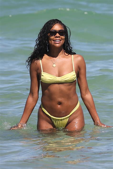 Gabrielle Union Wows in Yellow Bikini, Smooches Dwyane Wade