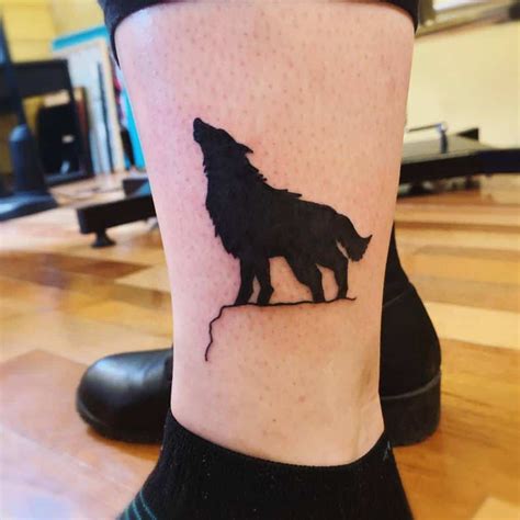 Wolf howling tattoo - loperswiki