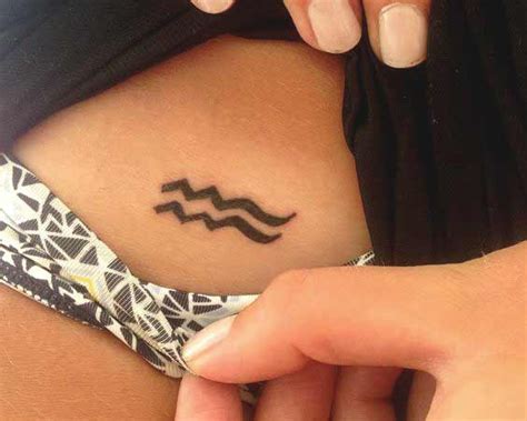 Share more than 64 aquarius finger tattoos - in.cdgdbentre