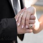 Wedding couple holding hands Stock Photo by ©8th 44759419