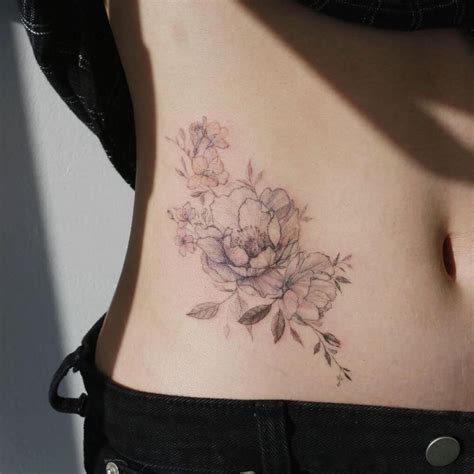 TATTOOS ON THE ABDOMEN 【50 ideas to inspire you HERE 👈】 【The Best of 2023】