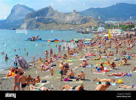 People at a sea beach in Sudak. Crimea, Russia Stock Photo - Alamy