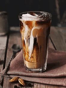Iced Coffee With Cream Glass GIF - Iced Coffee With Cream Glass Coffee - Discover & Share GIFs