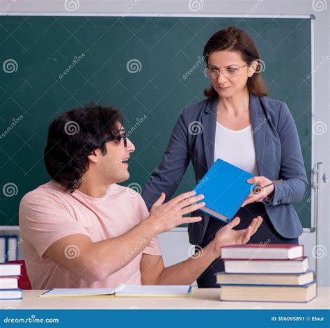 Old Female Teacher and Male Student in the Classroom Stock Image - Image of exam, knowledge ...