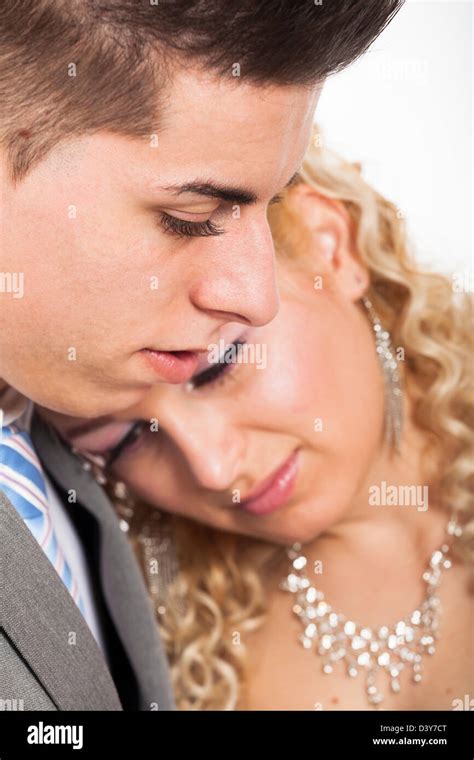 Couple hugging sad hi-res stock photography and images - Alamy