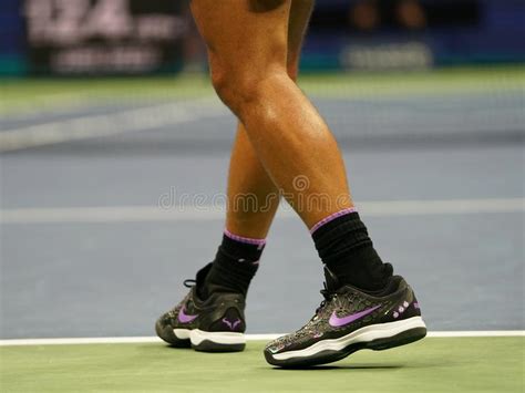 18-time Grand Slam Champion Rafael Nadal of Spain Wears Custom Nike Tennis Shoes during the 2019 ...