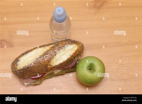 Healthy school lunch food with sandwich green apple and water bottle Stock Photo - Alamy