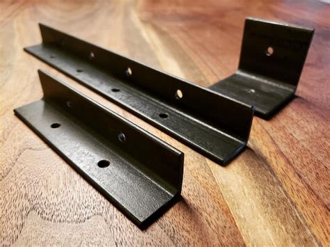 Steel angle brackets for those sturdy (and often hidden) connections. A ...