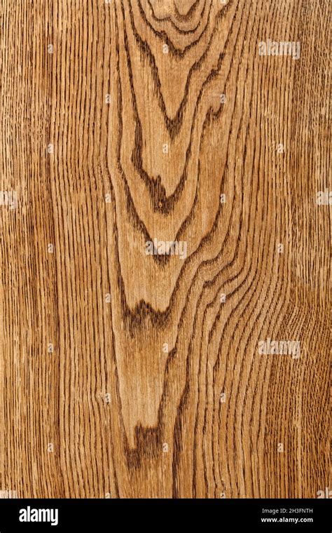 An expressive pattern of wavy light oak wood grain in the form of a ...