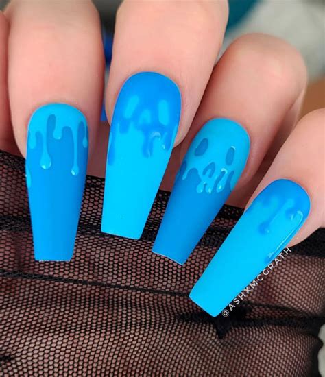 Dazzling Halloween Nails that Turn Heads : Melted Skull Blue Nails