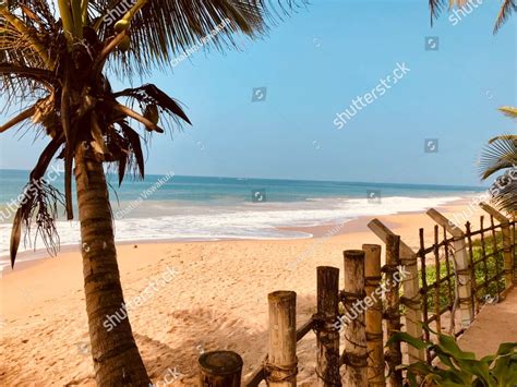 Srilankan Beaches - Induruwa, a beach with a wooden fence and palm trees Nature Stock Photos ...