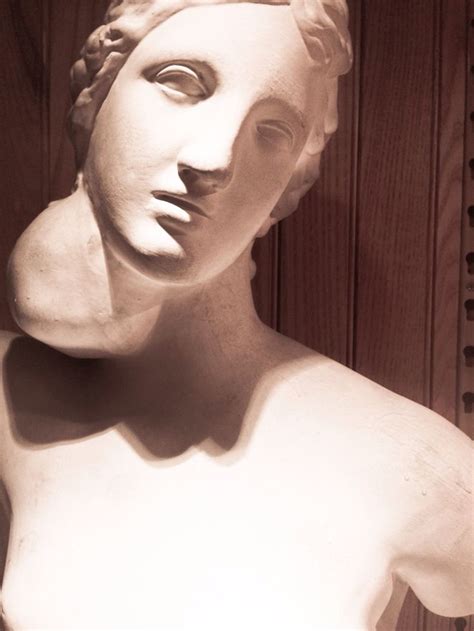 a statue of a woman's head and shoulders