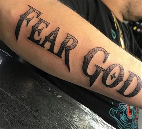 Top 47 Fear God Tattoo Ideas That Are Spiritual 5 in 2022 | God tattoos, Hand tattoos for guys ...