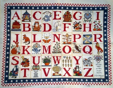 Items similar to Handmade cross stitch alphabet sampler ready to frame picture on Etsy