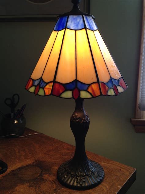 Pretty Tiffany style lamp, recently found in a consignment shop. Charming and warm for gues ...